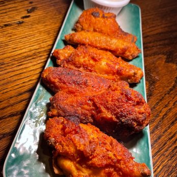 The Snug - a platter of chicken wings - Bars Near Me - Wantagh, New York