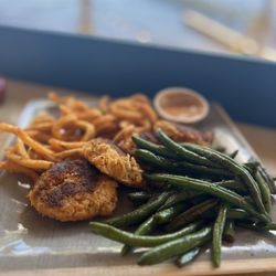 Boat House Tiki Bar & Grill - Closeup crab cakes green beans and curly fries. All was excellent.  I live for crab cakes and these were amazing!!