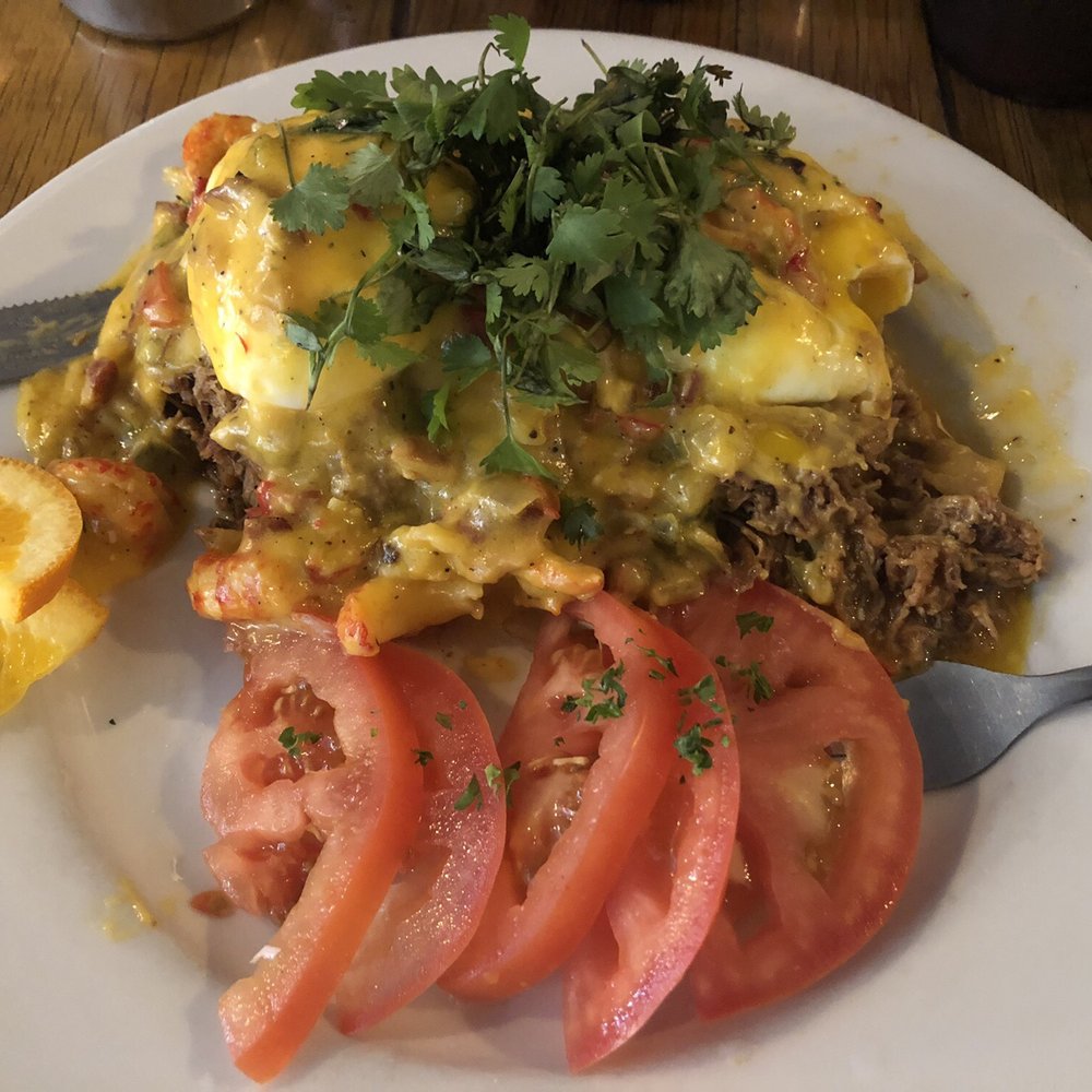 Backwater - Eggs Benedict, crawfish, pulled pork, hollandaise remoulade. So good. - Breakfast & Brunch Near Me - Melbourne, Florida