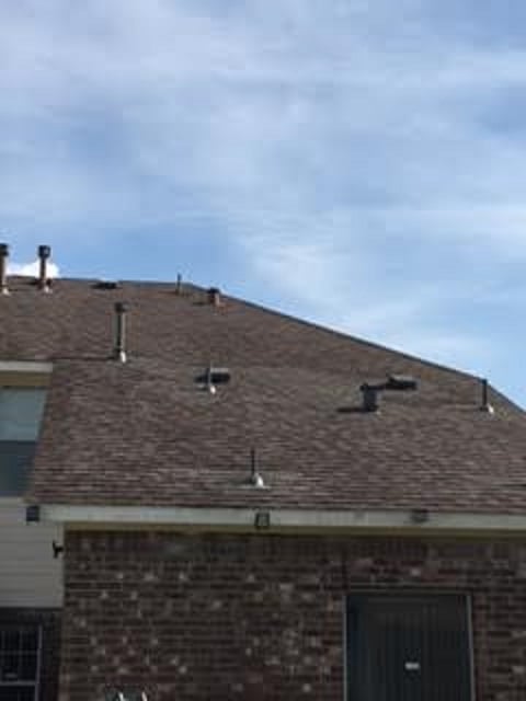 Slide of Coat of Arms Roofing