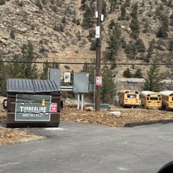 Idaho Springs RV Campground - Dumpy area with buses sitting right in front of where you are going to be looking.