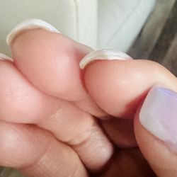 Nail product under nail