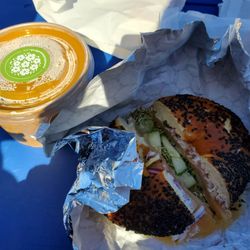 Cumin Kitchen and Drink - Trout and cream cheese bagel. Butternut squash soup