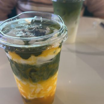 Claws and Cream - Mango sticky rice matcha - looks pretty, has purple rice pieces in it, can't taste mango after mixing, tasted like coconut milk matcha - Coffee & Tea Near Me - Garden Grove, California