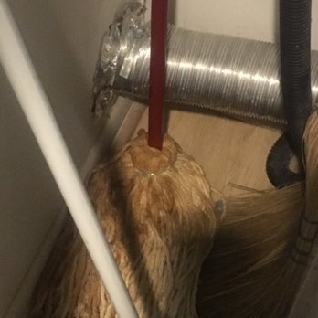 Resort Realty - Exterior of condo yachtsman 303 moldy mop in laundry closet - Property Management Near Me - Nags Head, North Carolina
