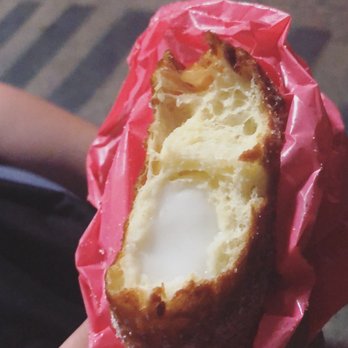 Leonard's Bakery - Haupia filled Malasada puff - Bakeries Near Me - Honolulu, Hawaii Leonard's Bakery - Haupia filled Malasada puff - Bakeries Near Me - Honolulu, Hawaii