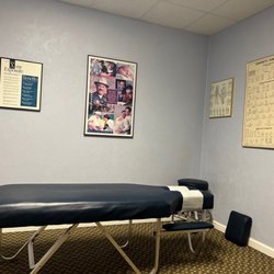 Dolmat Chiropractic Clinic - Room with table.