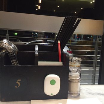 Papparich - Wrote down your order then press the green button for service - Malaysian Near Me - Bankstown, NSW