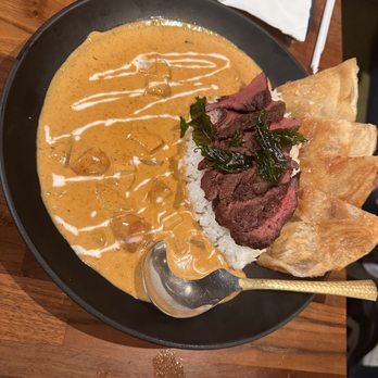 Hanuman Thai Eatery - Massaman Curry with med. rare skirt steak. - Thai Near Me - Costa Mesa, California Hanuman Thai Eatery - Massaman Curry with med. rare skirt steak. - Thai Near Me - Costa Mesa, California