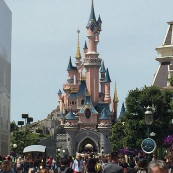 Disney Village - Cinderella's castle against the French sky - Amusement Parks Near Me - Chessy, 77