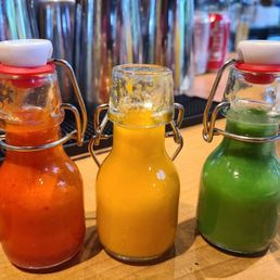 Trio of house-made hot sauces