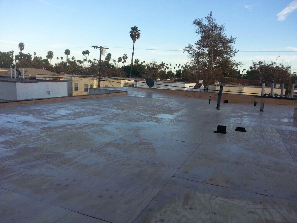 Slide of Millenium Roofing Enterprise