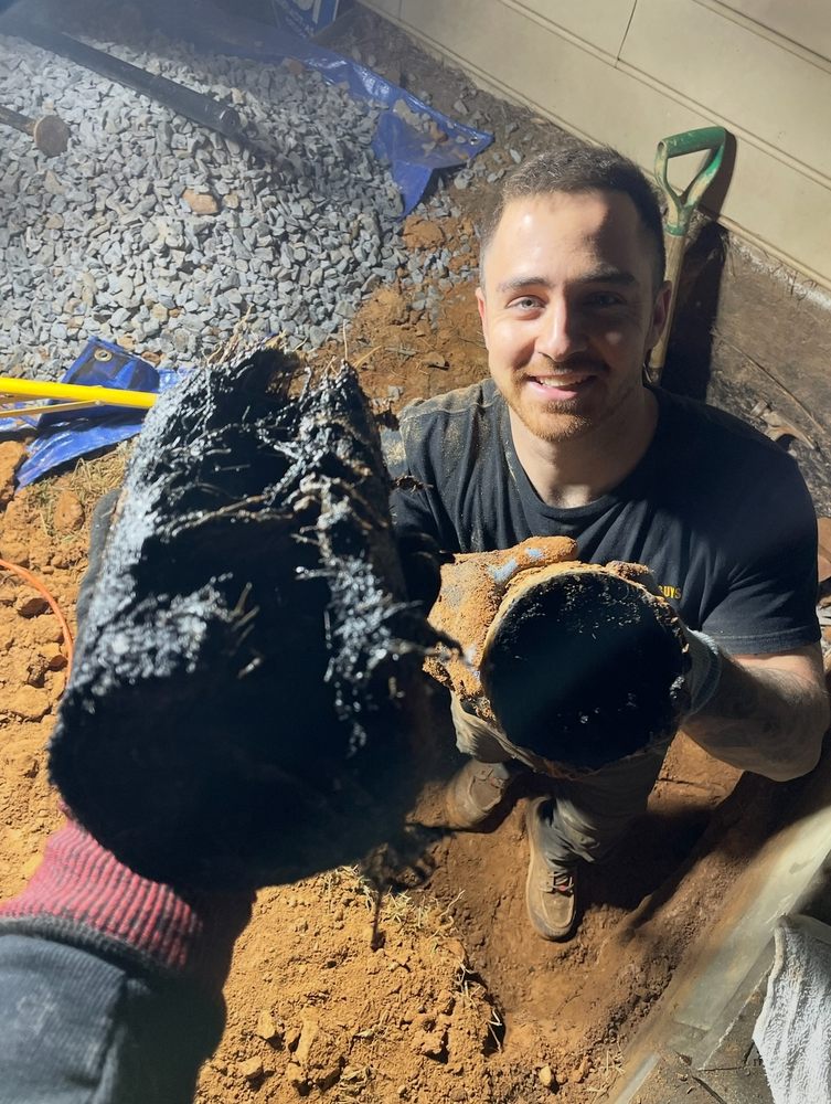 Slide of The Drain Guys