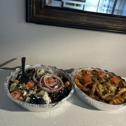 Greek poutine (it had gyro meat on top) and salad Greek poutine (it had gyro meat on top) and salad