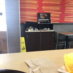 a table with a sandwich on it a table with a sandwich on it