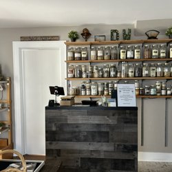Dandelion Wellness - Our Safe Rootz herb wall in our Shoppe