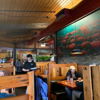 Moose's Tooth - Sitting area by beer ordering bar - Pizza Near Me - Anchorage, Alaska Moose's Tooth - Sitting area by beer ordering bar - Pizza Near Me - Anchorage, Alaska