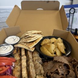 These is their 3 meat platter. Comes with Greek potatoes or rice or fries. These is their 3 meat platter. Comes with Greek potatoes or rice or fries.
