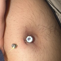 Monsters Ink Tattoo Gallery - My extremely irritated navel piercing (this piercing was fully heeled prior to getting the jewelry change.)