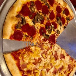 Henriquez Pizza - Half pepperoni and mushrooms half ham and pineapple