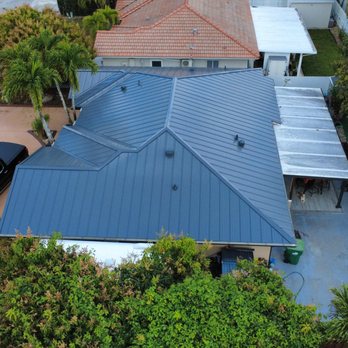Maze Roofing - New metal roof replacement completed by Maze Roofing in Miami, FL 33177. - Roofing Near Me - Fort Lauderdale, Florida Maze Roofing - New metal roof replacement completed by Maze Roofing in Miami, FL 33177. - Roofing Near Me - Fort Lauderdale, Florida
