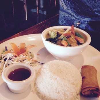 Cha Baa Thai - Yummy green vegetable curry.  I adore the food here!  Notice carved carrot flower and half globe of white rice. - Thai Near Me - Dartmouth, Nova Scotia