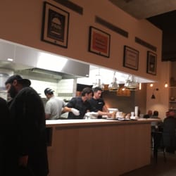 Alfred - The grills and grillers are visible. The aroma fills the restaurant.