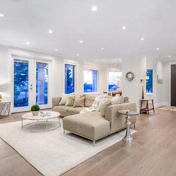 Percy John Flooring - a living room with hardwood floors - Flooring Near Me - Burnaby, British Columbia Percy John Flooring - a living room with hardwood floors - Flooring Near Me - Burnaby, British Columbia