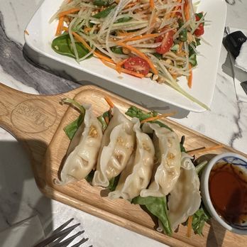 Niyom Thai Kitchen - Papaya salad and veggie dumplings - Thai Near Me - Flushing, New York Niyom Thai Kitchen - Papaya salad and veggie dumplings - Thai Near Me - Flushing, New York