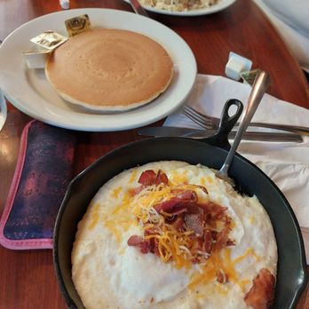 Flapjack's Pancake Cabin - Bacon Grits Skillet with pancakes $12.49 - Breakfast & Brunch Near Me - Gatlinburg, Tennessee Flapjack's Pancake Cabin - Bacon Grits Skillet with pancakes $12.49 - Breakfast & Brunch Near Me - Gatlinburg, Tennessee