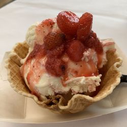 Emmy’s Ice Cream Bar - Strawberry cheesecake ice cream with strawberry topping in a waffle bowl.