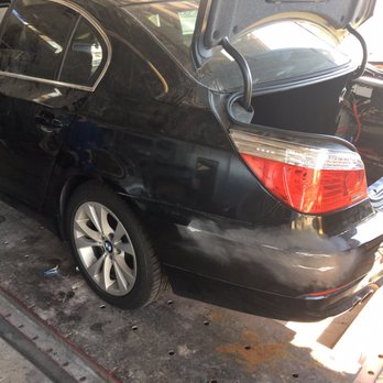 DeFio's Paint & Body Shop - These are the photos of the additional damage on the rear driver side. Plus the progress on the door after a few weeks - Body Shops Near Me - Ocala, Florida