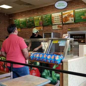 Subway - a man ordering food at a restaurant - Sandwiches Near Me - Ruskin, Florida