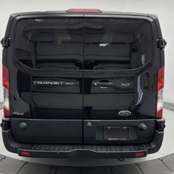 Shuttle Van Service - Tinted privacy glass for ensured comfort during your commute!