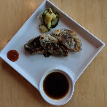 Pacific Rim - Pan-fried chive and shiitake mushroom dumplings. - Asian Fusion Near Me - Ann Arbor, Michigan Pacific Rim - Pan-fried chive and shiitake mushroom dumplings. - Asian Fusion Near Me - Ann Arbor, Michigan