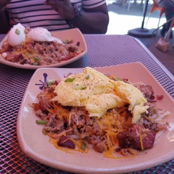 Snooze, an A.M. Eatery - Spud Deluxe with Bacon, Sausage, and scrambled eggs - Breakfast & Brunch Near Me - Tempe, Arizona