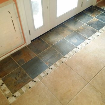 Az Property Doctors - Original tile had cracked from settling at back patio door.
I removed cracked tile and installed slate with a border tile design. - Handyman Near Me - Maricopa, Arizona