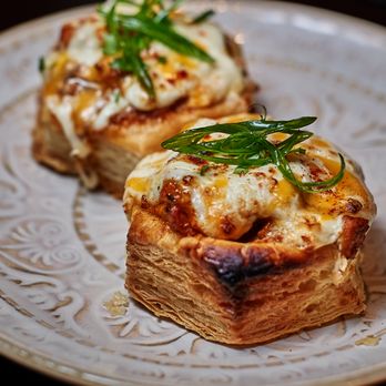 IST Snack Bar - two pieces of pizza on a plate - Indian Near Me - Toronto, Ontario
