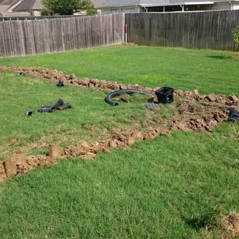 Integrity Landscape and Design - a back yard with a fenced in area - Landscaping Near Me - Arlington, Tennessee Integrity Landscape and Design - a back yard with a fenced in area - Landscaping Near Me - Arlington, Tennessee