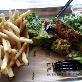 PINCHO - Pincho burger lettuce wrap and classic fries - Latin American Near Me - Cypress, Texas PINCHO - Pincho burger lettuce wrap and classic fries - Latin American Near Me - Cypress, Texas