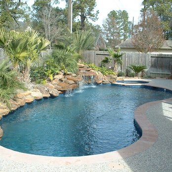 Malibu Pools - Custom natural rock waterfall - Pool Cleaners Near Me - Miami, Florida Malibu Pools - Custom natural rock waterfall - Pool Cleaners Near Me - Miami, Florida