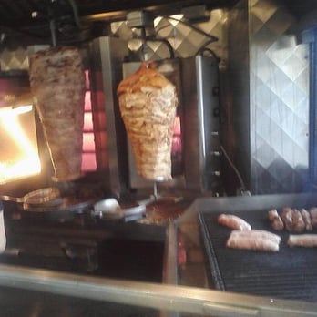 BZ Grill - Photoed w. Cell Camera: Racks of Pork and Chicken with the grill - Greek Near Me - Astoria, New York BZ Grill - Photoed w. Cell Camera: Racks of Pork and Chicken with the grill - Greek Near Me - Astoria, New York
