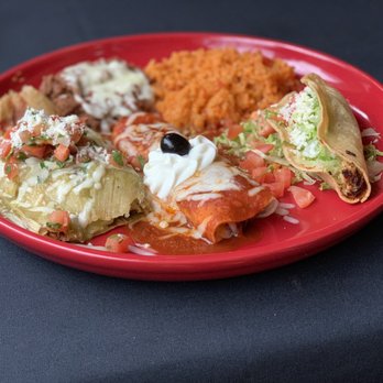 La Vida Catrina - Combination Plate: Pork tamale with green sauce, beef enchilada with red sauce & a chicken taco - Mexican Near Me - Salem, Oregon La Vida Catrina - Combination Plate: Pork tamale with green sauce, beef enchilada with red sauce & a chicken taco - Mexican Near Me - Salem, Oregon