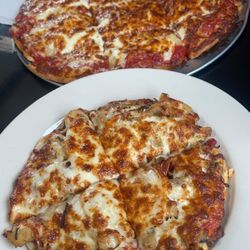 Al’s Woody's - Delux pizza and pineapple extra cheese. So good!!