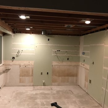 Grant Maury Construction - After demo and after they removed the false ceiling to give us six extra inches of ceiling space. - General Contractors Near Me