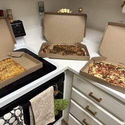 Large pizzas for my dogs bday party & the humans loved it dogs didn't get any haha