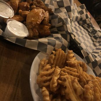 Eat Crow - Honey hot wings with waffle fries! - Bars Near Me - St. Louis, Missouri