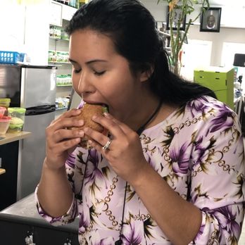Roselle Heath Plus - A satisfied customer enjoying one of our tasty Vegan Burgers. - Trainers Near Me - Roselle, New Jersey