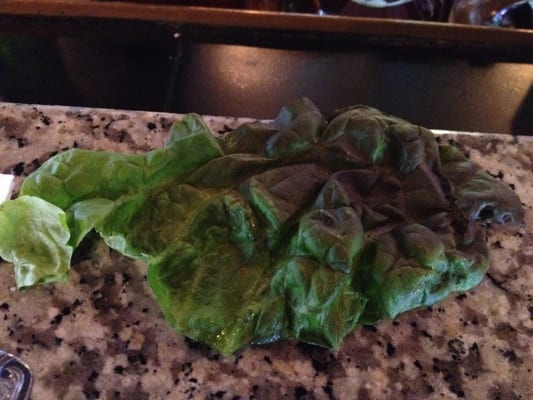 Photo of South Park Bar & Grill - Montclair, NJ, US. This piece of DRY wilted lettuce was on my burger. Burger was great though....