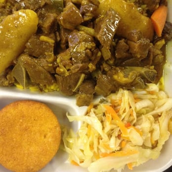 Jamaican Vibes Restaurant - Curry goat with cabbage and cornbread - Caribbean Near Me - Mobile, Alabama Jamaican Vibes Restaurant - Curry goat with cabbage and cornbread - Caribbean Near Me - Mobile, Alabama
